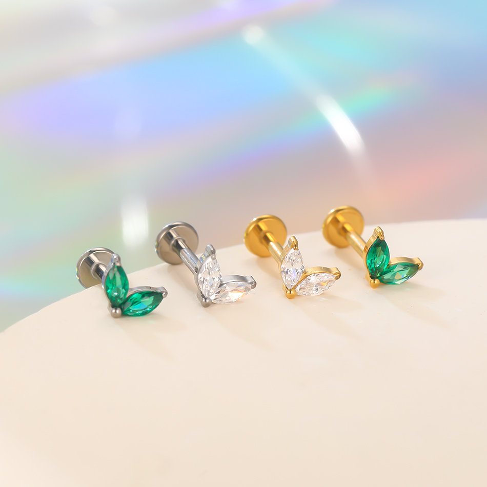1pc Titanium White Green Zirco - Flat Back Labret Stud recension och pris